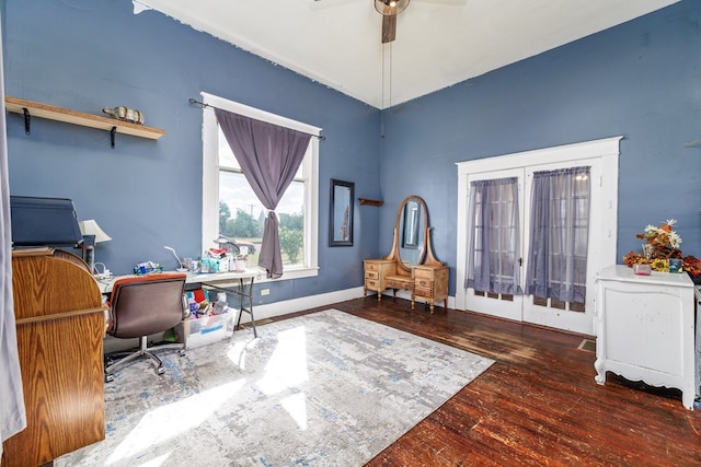 office area featuring french doors, ceiling fan, and dark hardwood / wood-style floors