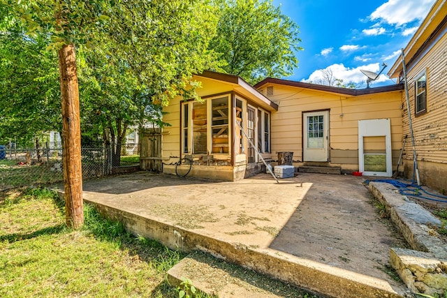 rear view of property with a patio