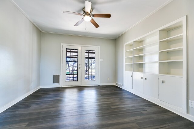 5438 S Loop 306, San Angelo, TX 76905 - unfurnished room with baseboards, crown molding, ceiling fan, and dark wood-style floors