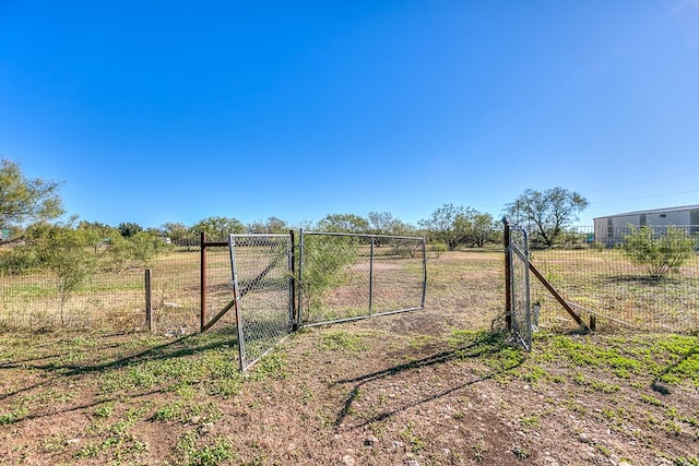 5438 S Loop 306, San Angelo, TX 76905 - view of yard with a gate, fence, and a rural view