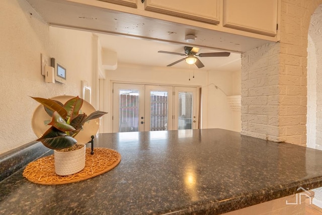 details with french doors and ceiling fan