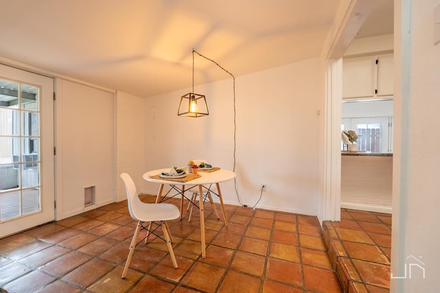 dining space featuring visible vents