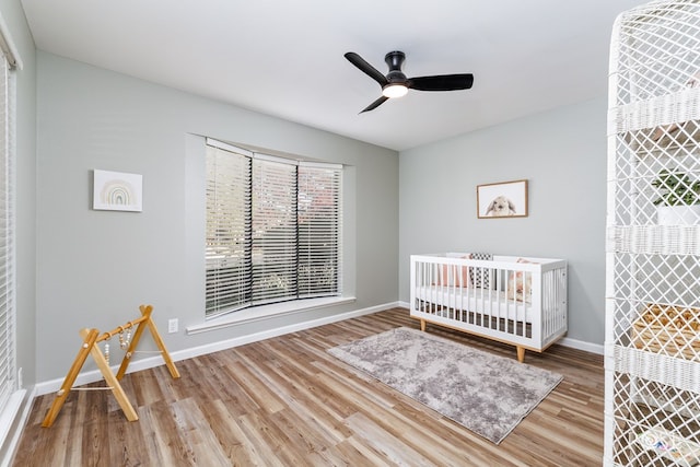 unfurnished bedroom featuring ceiling fan and light hardwood / wood-style floors