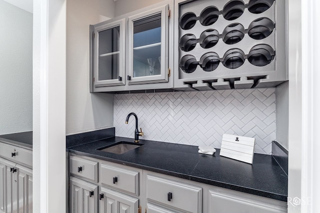 kitchen with sink and decorative backsplash