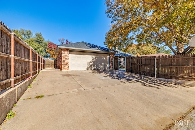 view of side of home with a garage