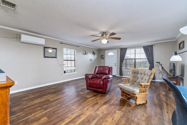 living room featuring a healthy amount of sunlight, a wall mounted air conditioner, wood finished floors, and crown molding