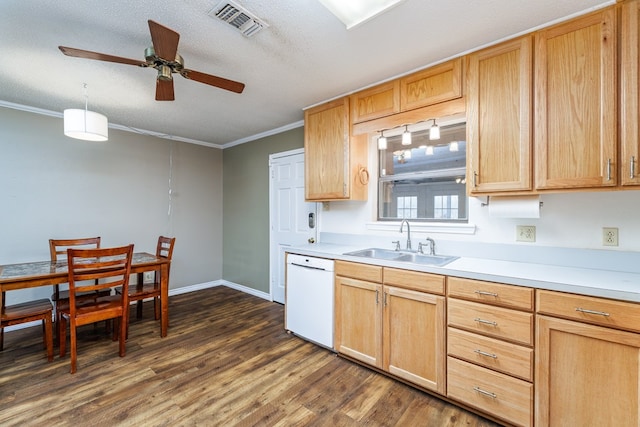 kitchen with visible vents, dark wood-style flooring, white dishwasher, crown molding, and a sink