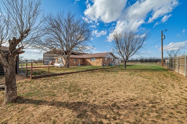 view of yard with fence