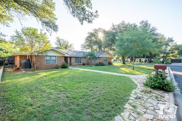 ranch-style house with a front yard