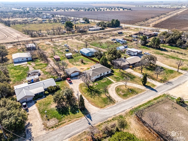 birds eye view of property featuring a rural view