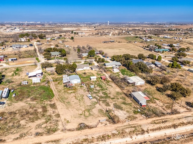 birds eye view of property featuring a rural view