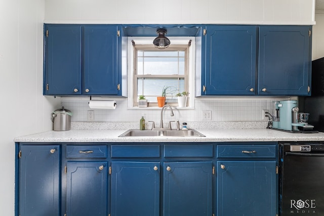 kitchen featuring blue cabinets and sink