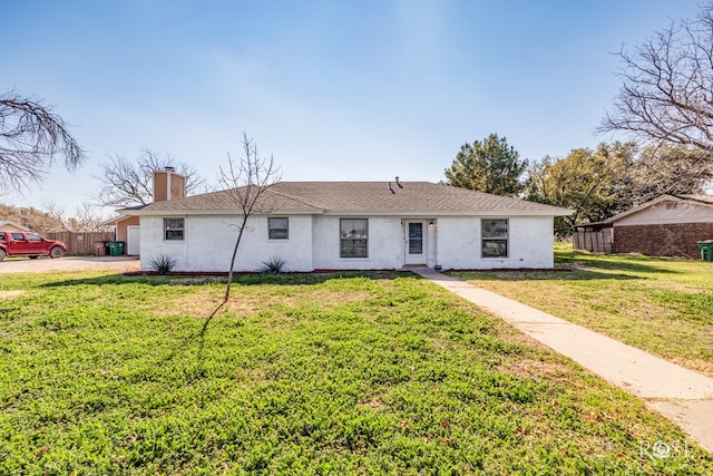 view of front of home with a front yard