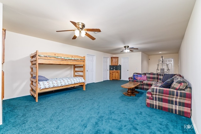 bedroom with carpet floors, baseboards, and a ceiling fan