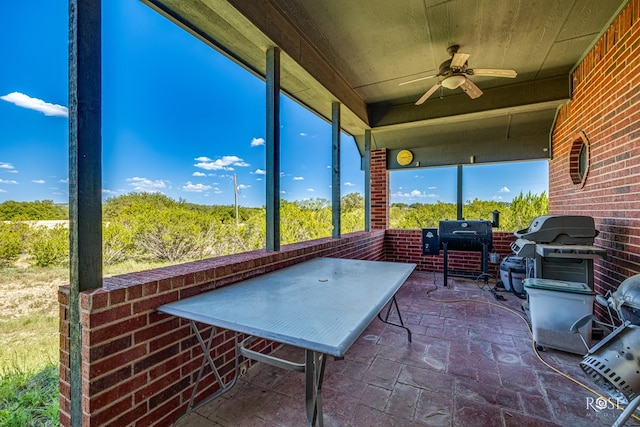 exterior space with wood ceiling and ceiling fan