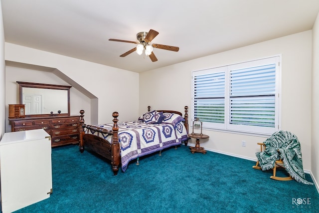 carpeted bedroom with a ceiling fan and baseboards