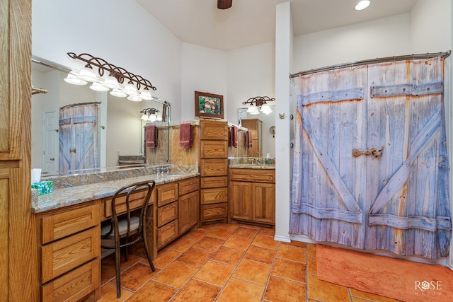 bathroom with vanity and tile patterned floors