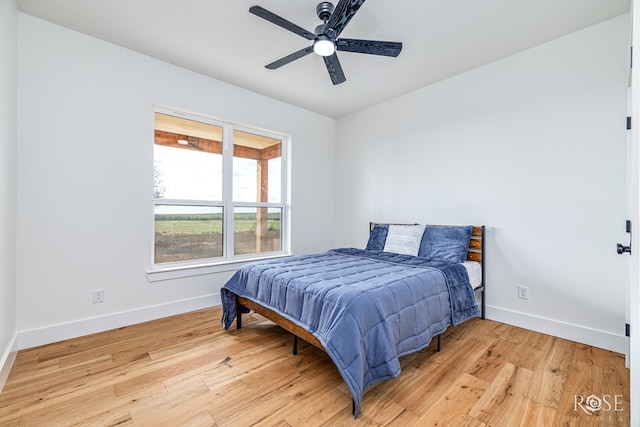 9401 Collett Rd, Robert Lee, TX 76945 - bedroom featuring light wood-style flooring and ceiling fan