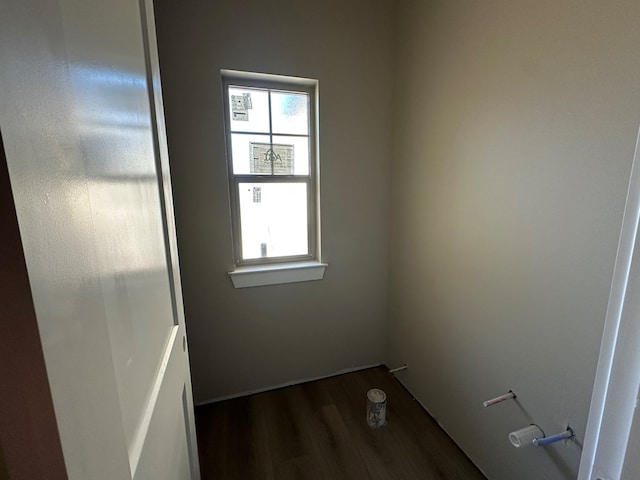 empty room with dark wood finished floors