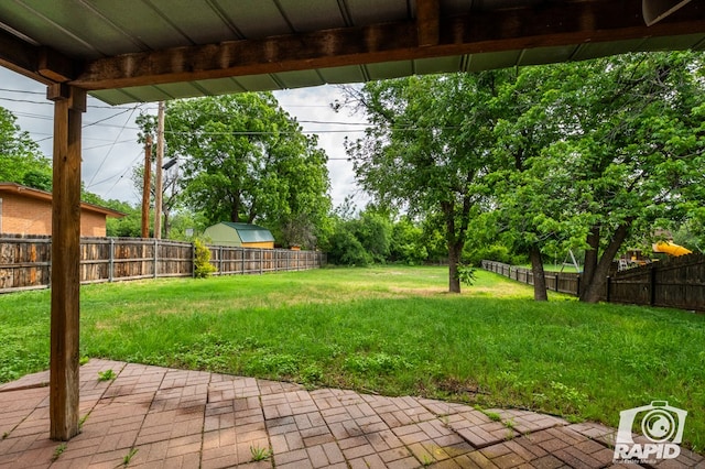 1016 N Adams Ave, San Angelo, TX 76901 - view of yard with a patio and a fenced backyard