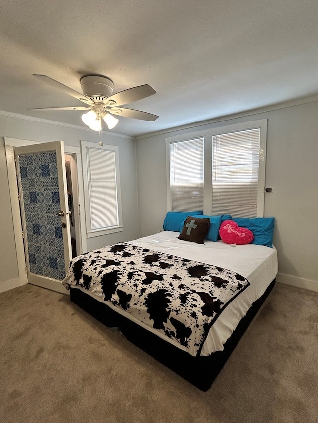 15E 24th St, San Angelo, TX 76903 - bedroom featuring carpet flooring, a ceiling fan, and ornamental molding
