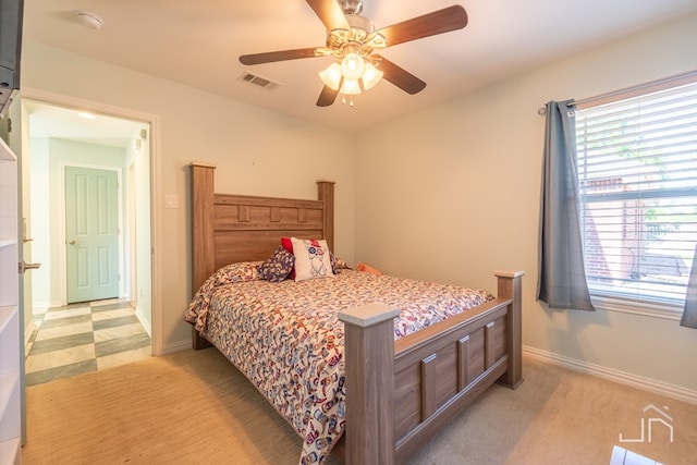 3067 Champions Cir, San Angelo, TX 76904 - bedroom featuring multiple windows, baseboards, and light carpet