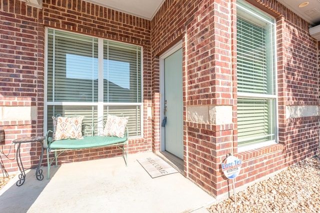 3067 Champions Cir, San Angelo, TX 76904 - entrance to property featuring brick siding and covered porch