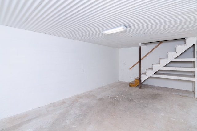 finished below grade area featuring stairs