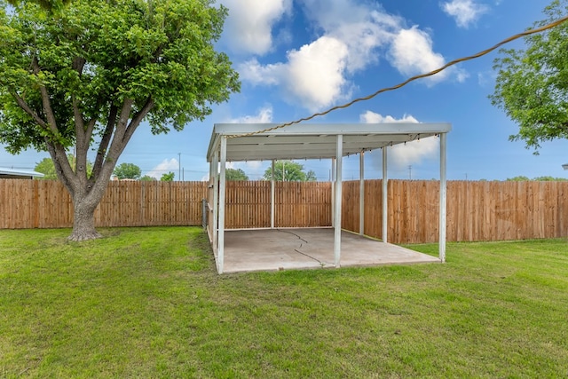 view of yard featuring a patio area and a fenced backyard