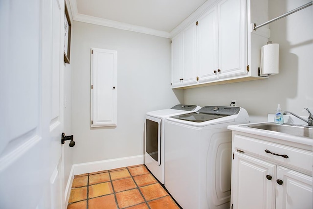 5413 Bent Oak Ct, San Angelo, TX 76904 - washroom featuring cabinet space, separate washer and dryer, ornamental molding, baseboards, and light tile patterned flooring