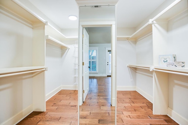 5413 Bent Oak Ct, San Angelo, TX 76904 - walk in closet with light wood-type flooring