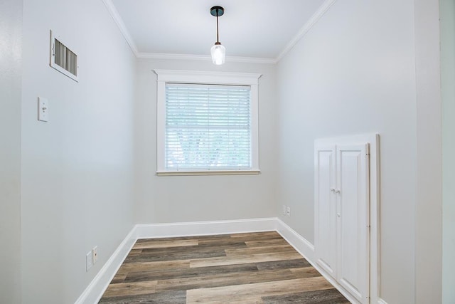 5413 Bent Oak Ct, San Angelo, TX 76904 - unfurnished room featuring crown molding, dark wood-type flooring, and baseboards