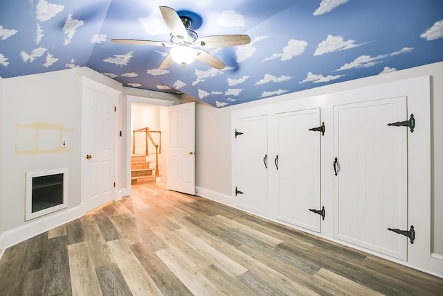 5413 Bent Oak Ct, San Angelo, TX 76904 - bonus room featuring vaulted ceiling, light wood-type flooring, a ceiling fan, baseboards, and stairs