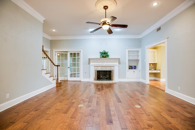 5413 Bent Oak Ct, San Angelo, TX 76904 - unfurnished living room featuring a ceiling fan, recessed lighting, wood finished floors, crown molding, and stairs