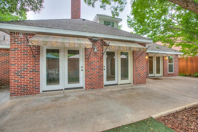 5413 Bent Oak Ct, San Angelo, TX 76904 - back of house featuring a patio area, french doors, and brick siding