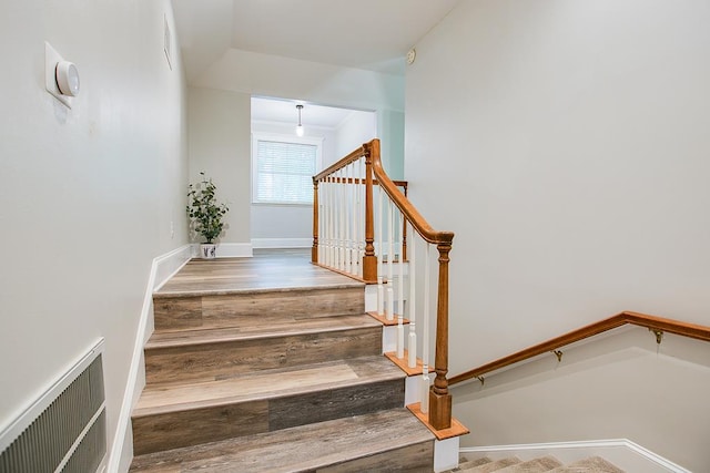 5413 Bent Oak Ct, San Angelo, TX 76904 - stairs featuring baseboards and wood finished floors