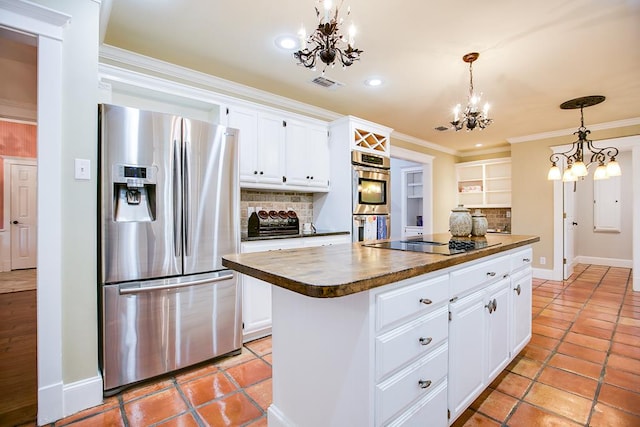 5413 Bent Oak Ct, San Angelo, TX 76904 - kitchen with appliances with stainless steel finishes, a chandelier, a kitchen island, white cabinets, and recessed lighting