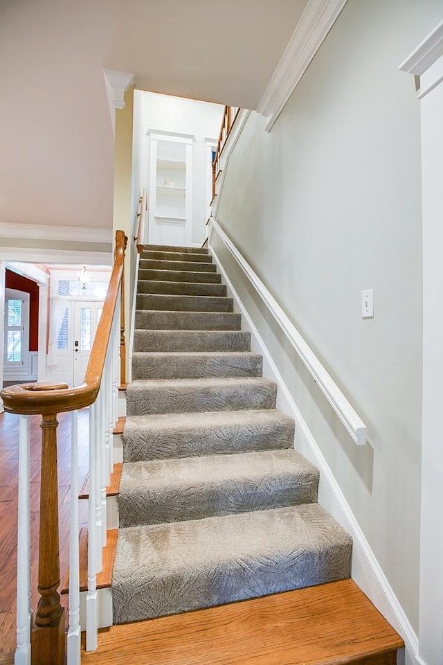5413 Bent Oak Ct, San Angelo, TX 76904 - stairway with wood finished floors, baseboards, and crown molding