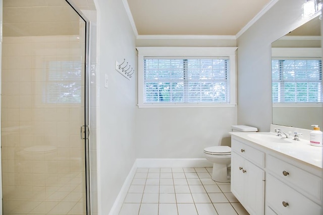 5413 Bent Oak Ct, San Angelo, TX 76904 - bathroom with ornamental molding, healthy amount of natural light, tile patterned floors, toilet, and vanity