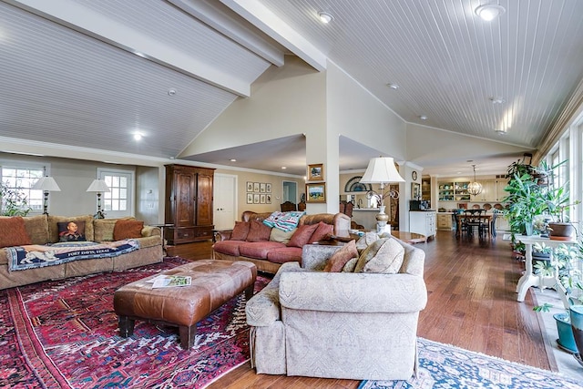 living room with beamed ceiling, ornamental molding, high vaulted ceiling, and hardwood / wood-style flooring