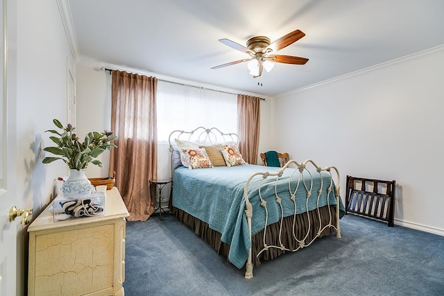 bedroom featuring ornamental molding, dark carpet, and ceiling fan