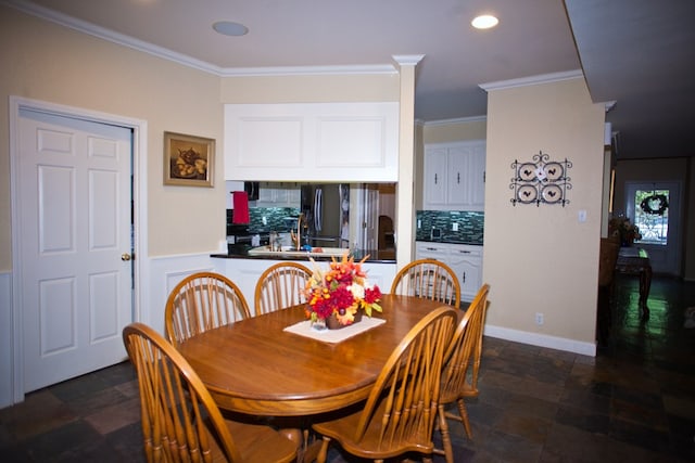 5114 Fairway Dr, San Angelo, TX 76904 - dining space with stone finish floors, crown molding, and recessed lighting