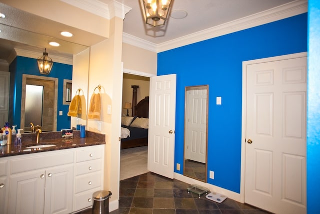 5114 Fairway Dr, San Angelo, TX 76904 - bathroom with crown molding, vanity, baseboards, recessed lighting, and connected bathroom