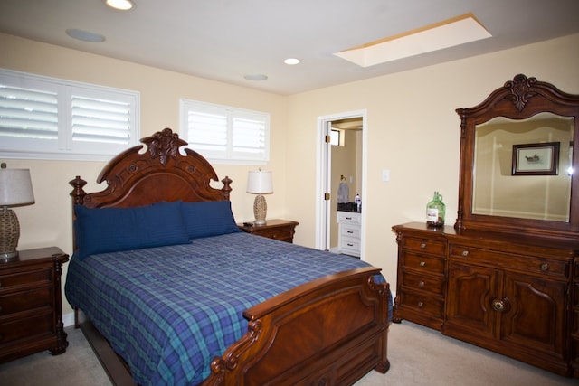 5114 Fairway Dr, San Angelo, TX 76904 - bedroom with light carpet, a skylight, and recessed lighting