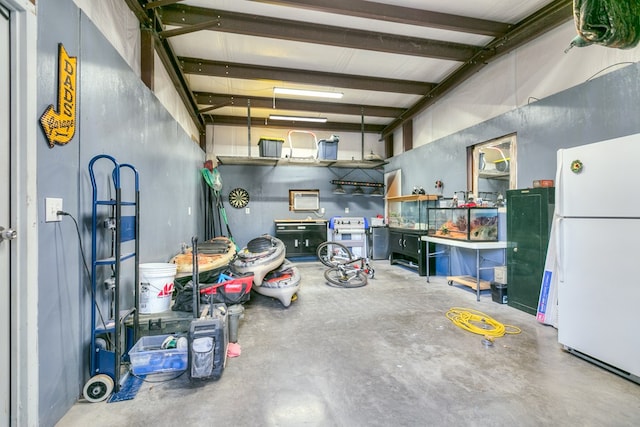 garage featuring white refrigerator