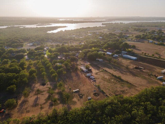 bird's eye view featuring a water view and a rural view