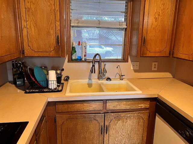 kitchen with sink and black stovetop