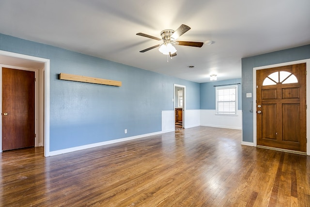 entryway featuring ceiling fan and dark hardwood / wood-style flooring