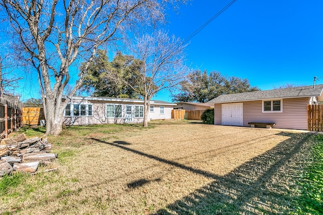 rear view of property featuring a yard