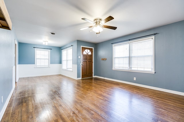 interior space with hardwood / wood-style flooring and ceiling fan